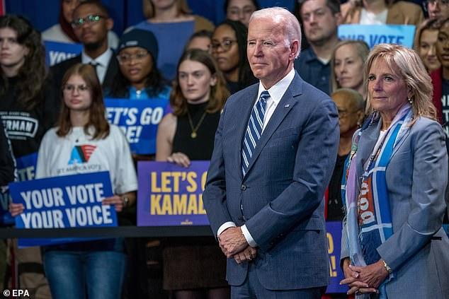 President Joe Biden and First Lady Jill Biden look on during a DNC post election event at the Howard Theater in Washington